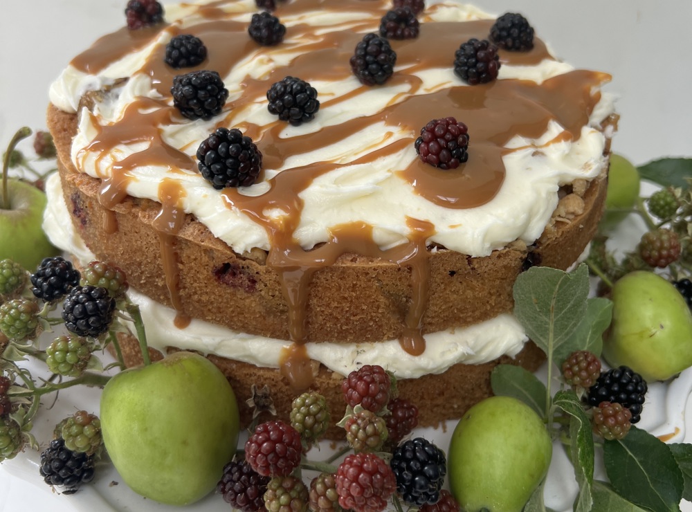 Blackberry, apple and pear crumble cake with sticky toffee sauce