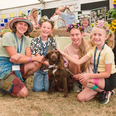 A family and cocker spaniel enjoying a day out at the Rutland Flower Show 