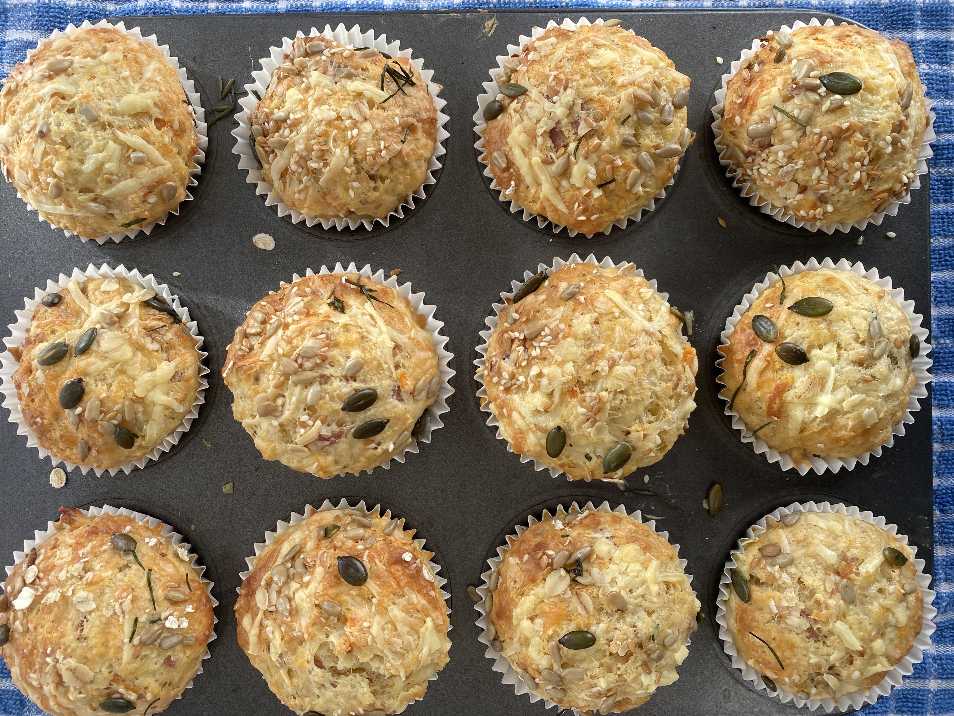 An image of golden brown breakfast muffins