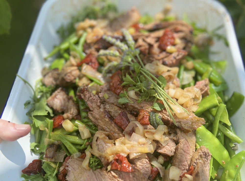 British beef with a green bean salad, sundried tomatoes and caramelised shallots