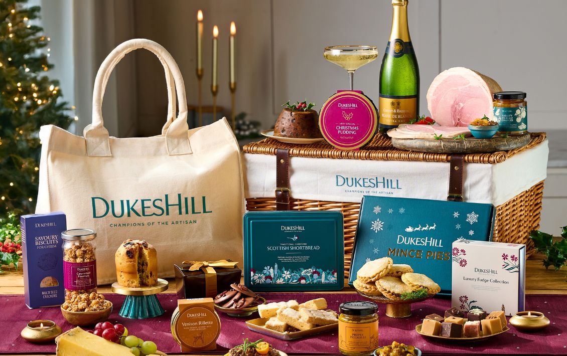 DukesHill Christmas hamper in a wicker basket and on a table 