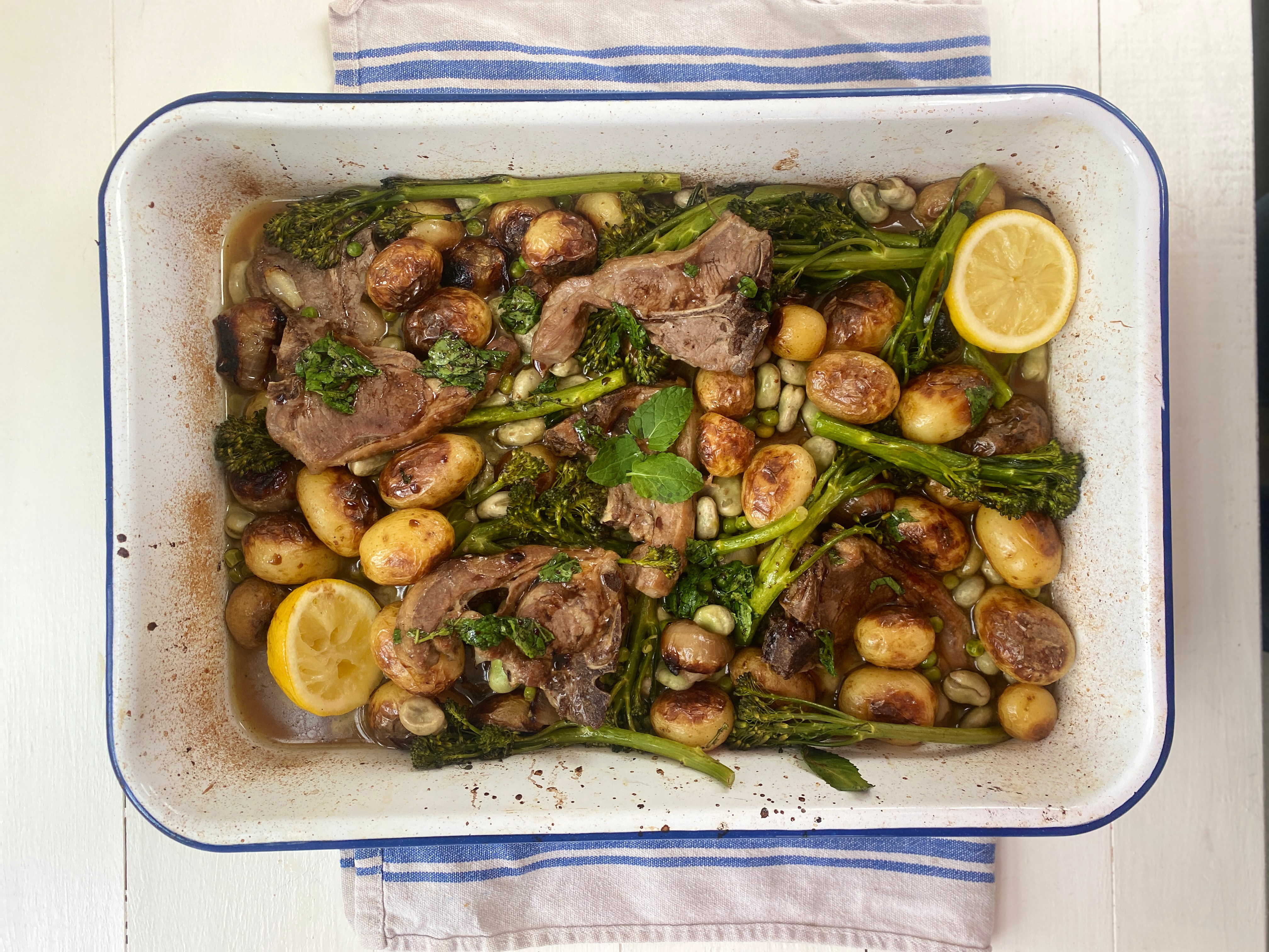 A picture of Miranda Gore Brown's lamb, green vegetables and mint traybake